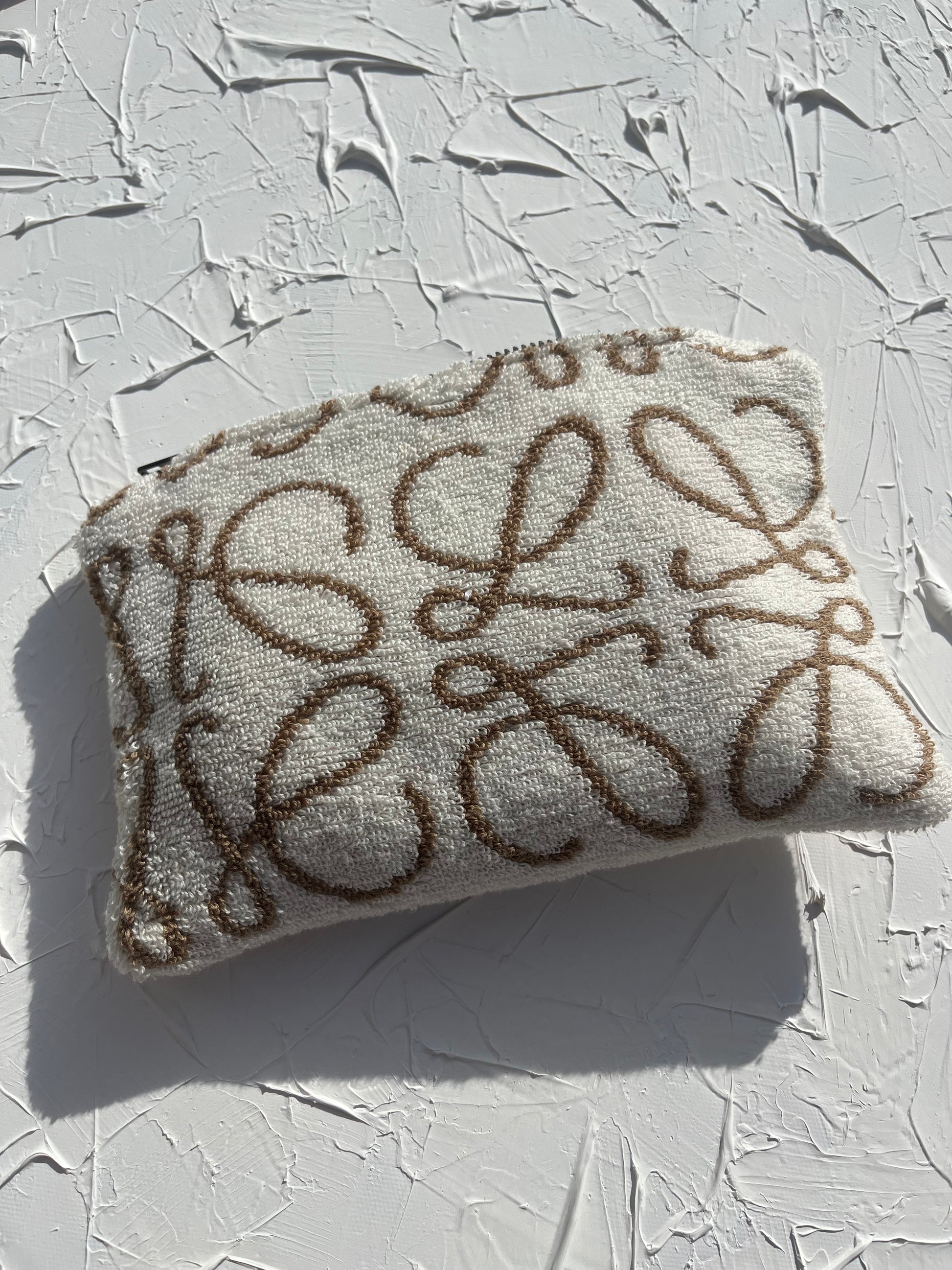 Beige and brown Loewe anagram printed mini pouch