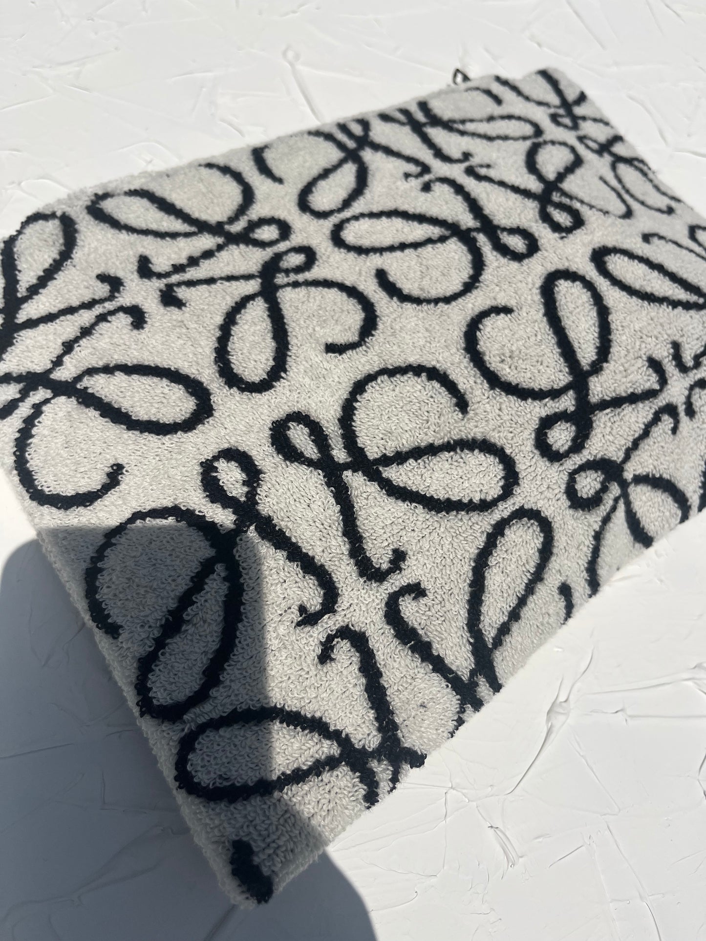 The Coco Pouch - the white one with the navy anagram